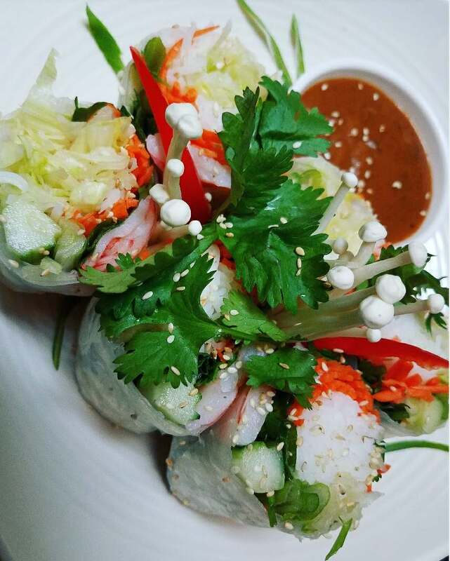 A signature dish at Thai Orchid Cuisine, plated with traditional Thai presentation.