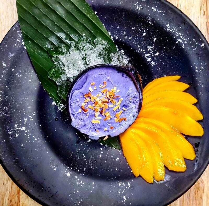 A vibrant Thai dish presented at Thai Orchid Cuisine, with rich color and fresh garnishes.